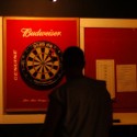 Bar Patrons Darts at Cue's in Marietta