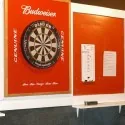 Bar Patrons Darts at Cue's in Marietta