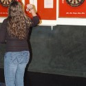 Bar Patrons Darts at Cue's in Marietta