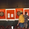 Bar Patrons Darts at Cue's in Marietta